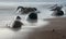 Inflow of a wave with stones on sand