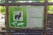 Information of alpaca on info board in city zoo
