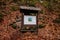 Information board on the top of sandstone rock formation, Hiking Golden Trail of Bohemian Paradise near Vranov castle Pantheon,