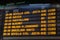 Information board of train departures at Atocha station in Madrid