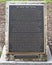 Information bronze plaque for `Dr. J.K.G. Silvey` by David Iles on the campus of the University of North Texas in Denton, Texas.