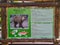 Information of brown bear on info board in zoo