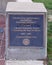 Information plaque for the Flagpole at the Grapevine Veteran`s Memorial in Grapevine, Texas eagle on top.