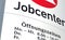 Information sign `Jobcenter` with opening times `Ã–ffnungszeiten` in German
