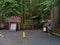 Information signs on the entrance of famous douglas fir forest Cathedral Grove, Vancouver Island.