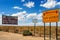 Information signs by the road at Four corners, USA