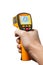 Infrared laser thermometer in hand