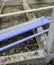 Infrastructure blue pipes prepare on foundation beam concrete for plumbling system. Yellow pipe pvc for eletric in unfinish house