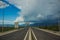 Infrastructure and transportation symmetry photography of empty car road highway in tropic Asian world district in cloudy weather