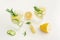 Infused water with rosemary, cucumber and lemon. On white background. Detox and fat burning