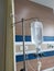 infusion bottles hanging in a hospital treatment facility