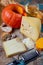 Ingrediens for traditional seasonal Swiss dish, pumpkin fondue with gruyer and emmentaler cheeses, white wine, fresh creme and