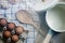 Ingredient in the kitchen with sunlight from the window. Close up view of ingredients of fried egg and vintage pot.