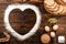 Ingredients of a bakery on a wooden background