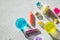 Ingredients,bottles, jars for making a popular children's toy from glue. jelly-like, trendy slime with balls for