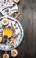 Ingredients for cooking apples with honey and nuts, cinnamon and seasonings, sliced apples with filling on a rustic wooden backgro