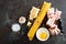 Ingredients for cooking Carbonara pasta, spaghetti with pancetta, egg and hard parmesan cheese. Traditional italian cuisine. Pasta