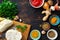 Ingredients cooking curry cauliflower dark background top view