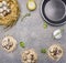 Ingredients for cooking fried quail eggs, oil and salt and herbs place for text,frame granitic rustic background top view clos