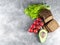 Ingredients for cooking homemade vegan hamburgers. avocado, tomato, green sprouts, black bread, salad