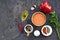 Ingredients for cooking lentil hummus on a dark concrete background