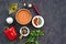 Ingredients for cooking lentil hummus on a dark concrete background. Top view, copyspace. Lentil Recipes