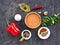 Ingredients for cooking lentil hummus on a dark concrete background. Top view, copyspace. Lentil Recipes