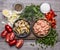 Ingredients for cooking mussels shrimp on a wooden cutting board wooden background top view