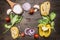 Ingredients for cooking raw pasta with mushrooms, peppers, basil and onions on wooden rustic background top view close up border,