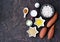 Ingredients for cooking sweet potato casseroles with marshmallows, a traditional Thanksgiving dessert on brown concrete background