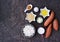 Ingredients for cooking sweet potato casseroles with marshmallows, a traditional Thanksgiving dessert on brown concrete background