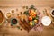 Ingredients for cooking Thanksgiving autumn apple pie with fresh fruits, cinnamon and walnuts on wooden table