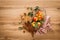 Ingredients for cooking Thanksgiving autumn apple pie with fresh fruits, cinnamon and walnuts on wooden table