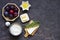 Ingredients for cooking unsweetened shortcrust pastry pie with plums, brie cheese and thyme