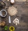 Ingredients for cooking vegetarian food , mushrooms, pepper, herbs and salt border ,place text wooden rustic background to