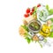 Ingredients for fresh green pesto sauce on white background