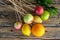 Ingredients for fruit bouquet. apples, orange, pear on wooden skewers