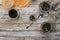 Ingredients for herbal teas on a wooden rustic background. Healing teas from wild plants. Glass sealed jars for storing food.