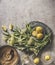 Ingredients  for homemade elder flower syrup: sugar, lemon and kitchen utensils on kitchen table.  Top view with copy space.