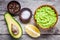 Ingredients for homemade guacamole: avocado, lemon, salt and pepper