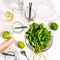 Ingredients for making mojito. Top view with copy space. Cooking mojito. Lime, mint, empty cocktail glass jars and rum