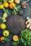 Ingredients for making natural drink, wooden round board in center