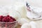 Ingredients for making raspberry mousse on a white table, recipe, diet food. close up