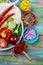 Ingredients for Mexican burito. restaurant fast food - wrapped with pork meat, mushrooms and vegetables closeup at wooden desk.