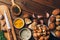 Ingredients for mushroom soup, mushrooms, garlic, spices on wooden table, top view, copy space. Autumn dinner