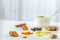Ingredients for orange turmeric breakfast. orange fruit with ginger, curcuma root, black pepper. honey, Yogurt,
