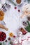 Ingredients for the preparation of homemade Christmas baking cranberries, flour, cinnamon, eggs and seasoning anise on a light