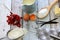 Ingredients for red currant cup cakes on wooden table