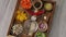 Ingredients served on tray ready to cook vegetable sauce from carrots, cashew nuts, yellow bell pepper, miso paste