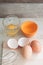 Ingredients and tools to make a cake, eggs, bakery cups
